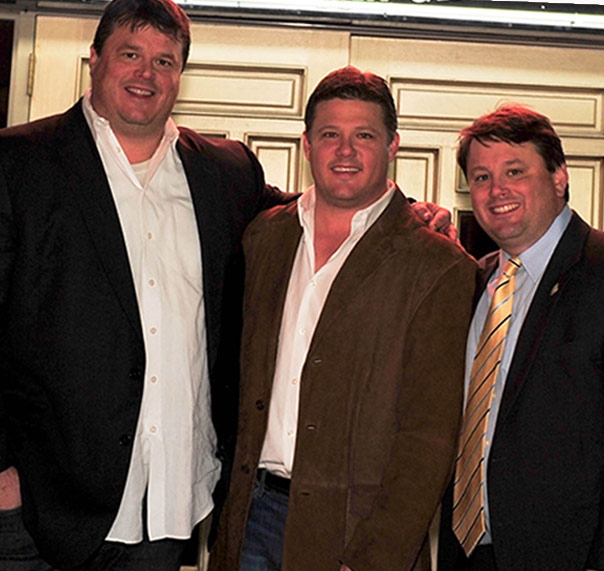 Paul, Steven, and Scott Ballard pictured together at a WOW Cafe event