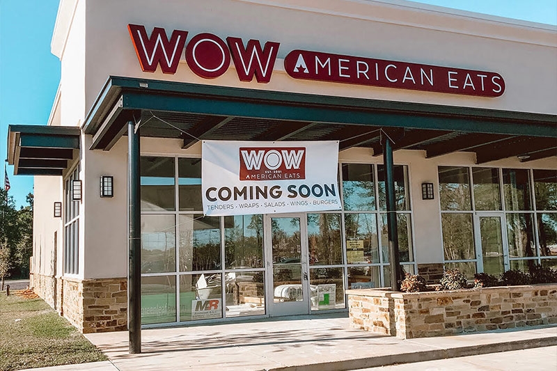 New WOW American Eats location in Covington, Louisiana with Coming Soon sign outside